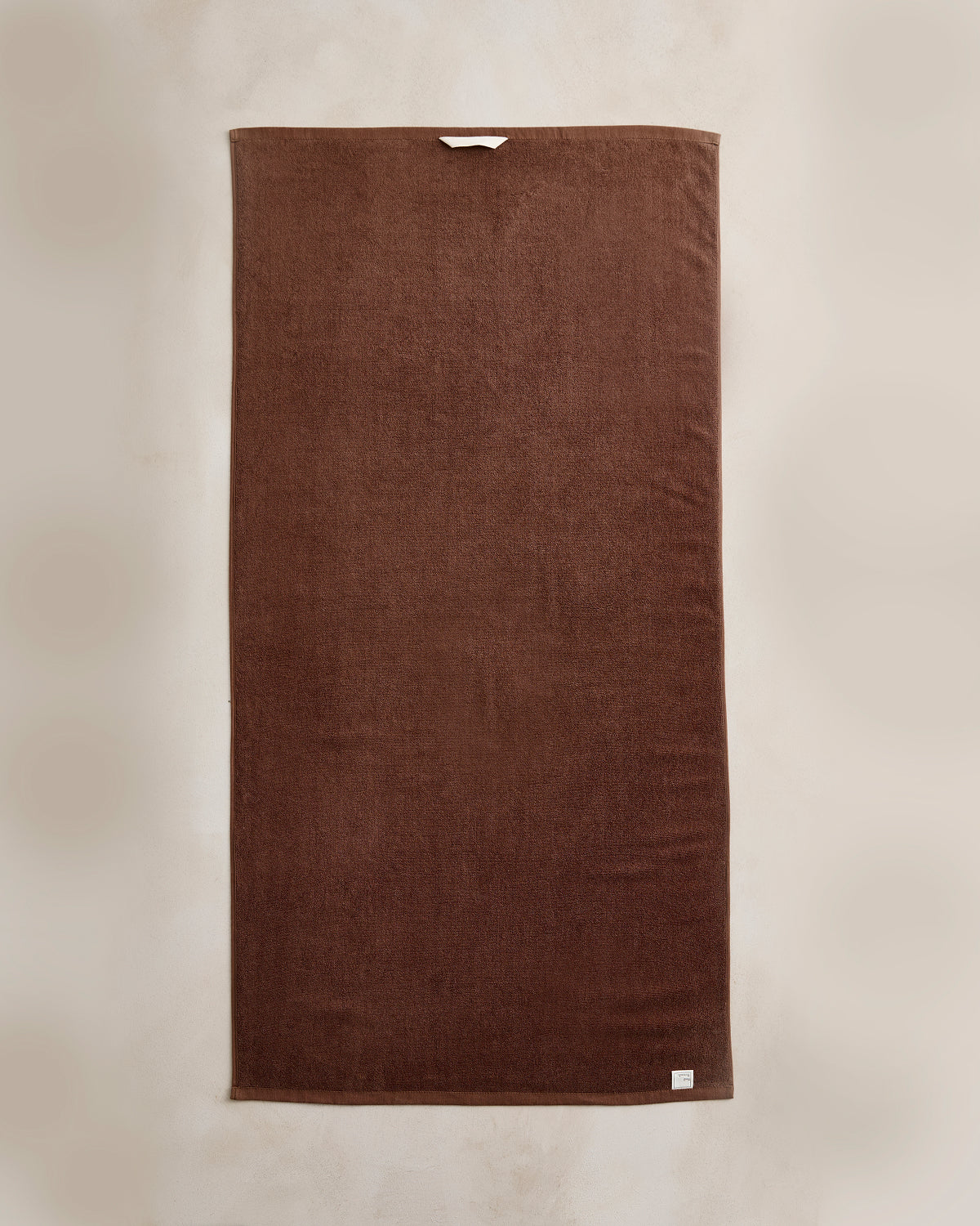 Serviette de bain en coton éponge couleur expresso