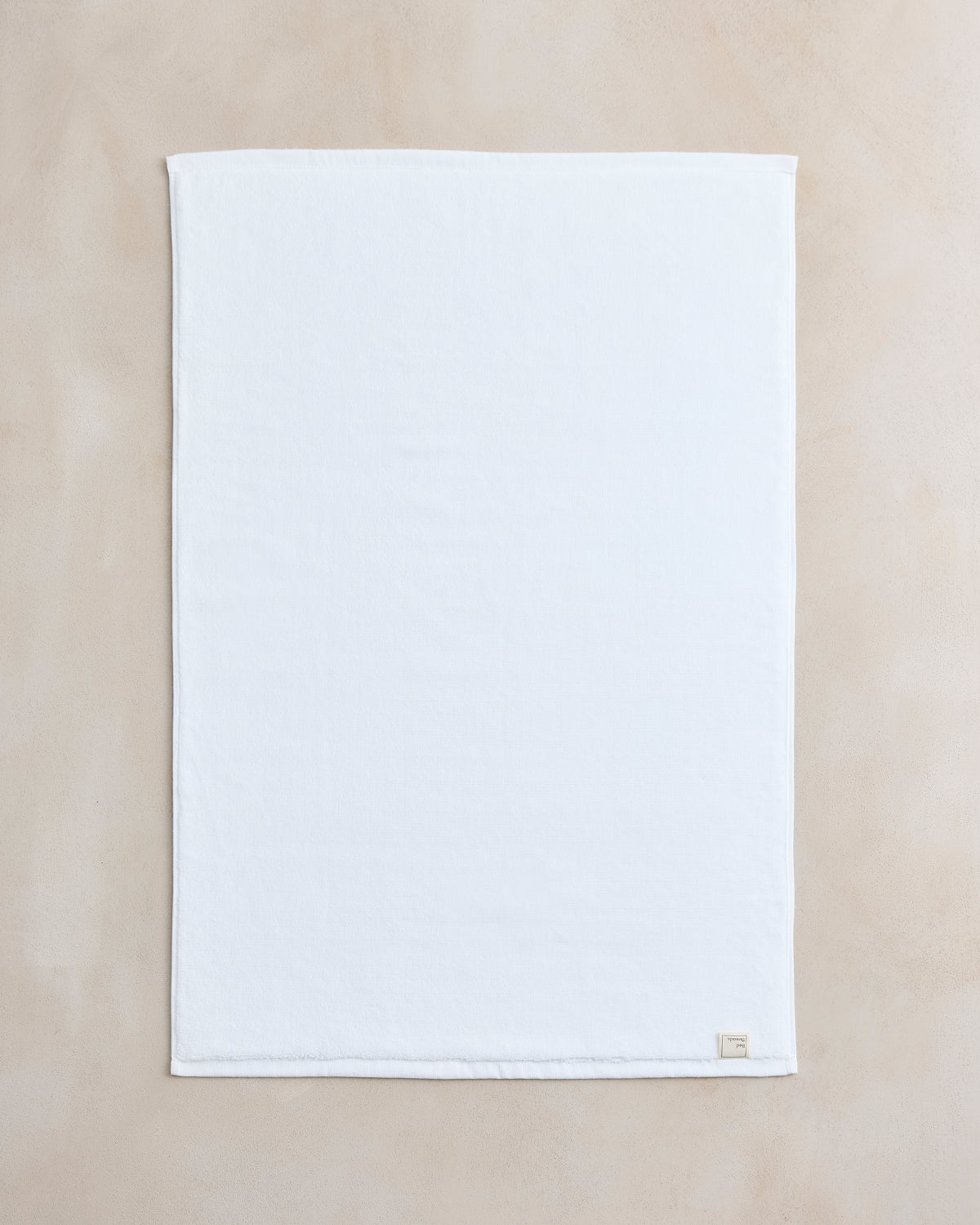 Tapis de bain en coton éponge blanc immaculé